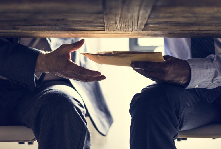 bribery_AdobeStock_202841995