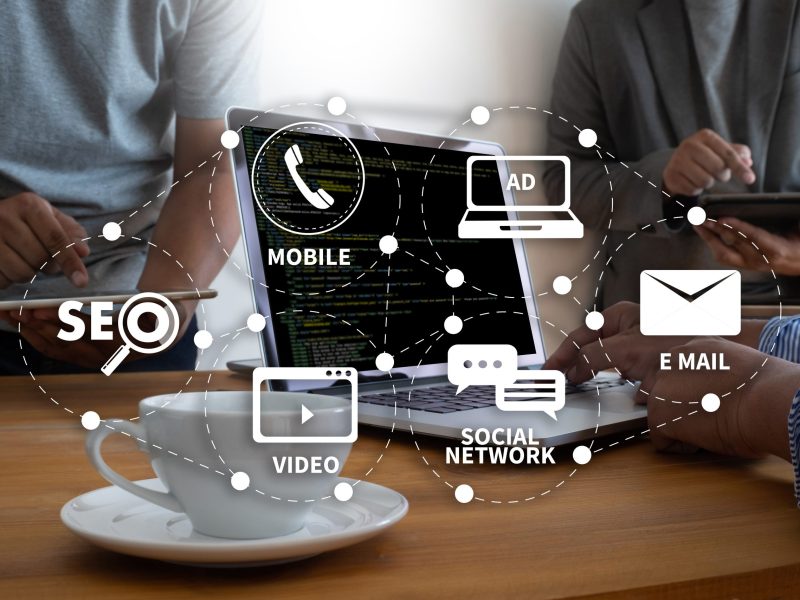 DIGITAL MARKETING new startup project MILLENNIALS Business team hands at work with financial reports and a laptop